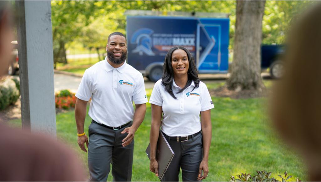 Roof Maxx dealers from Columbus, Ohio, visit a customer's home.