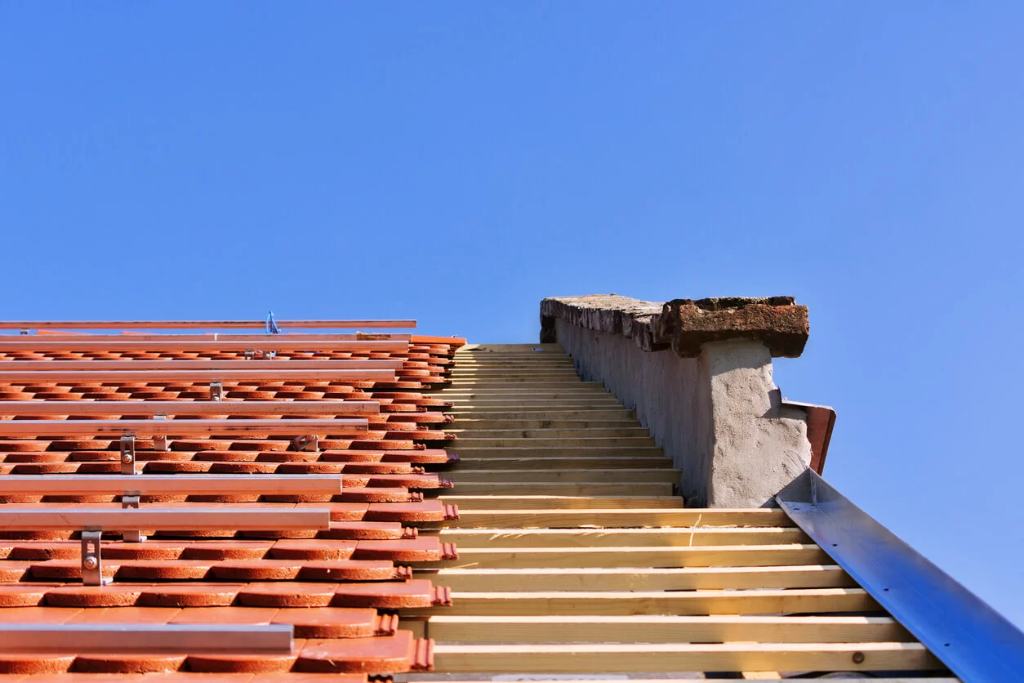 A wood shake roof with exposed underdecking