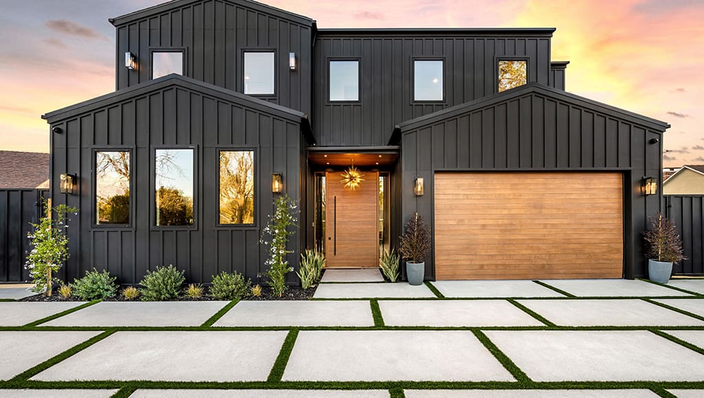 A contemporary home with a clean, modern style and metal siding.