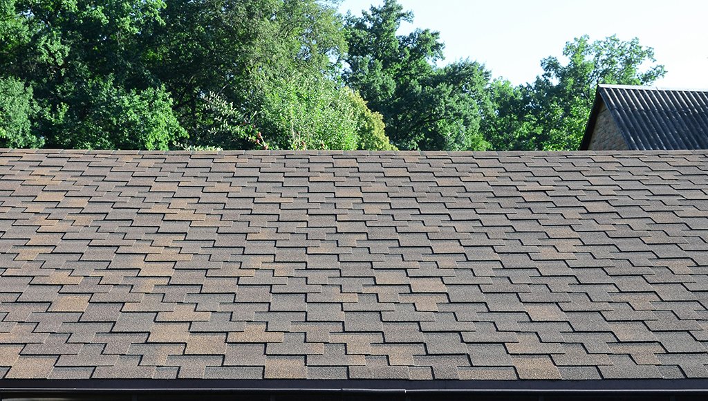 Impact-resistant architectural shingles on the roof of a customer's home.