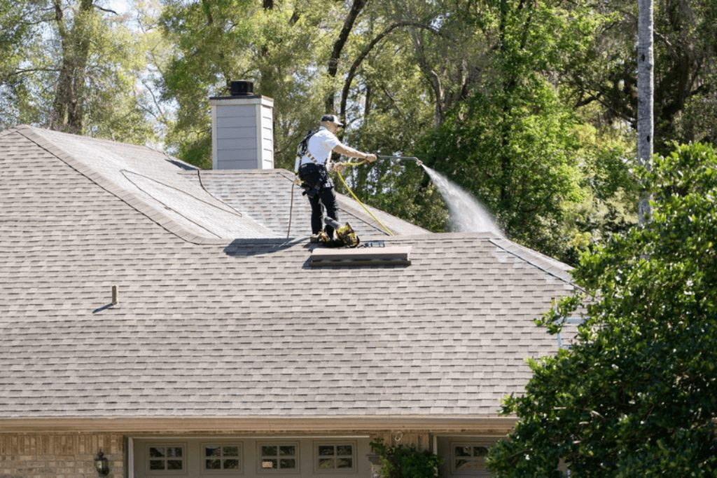 Roof Maxx professional spraying solution on asphalt
