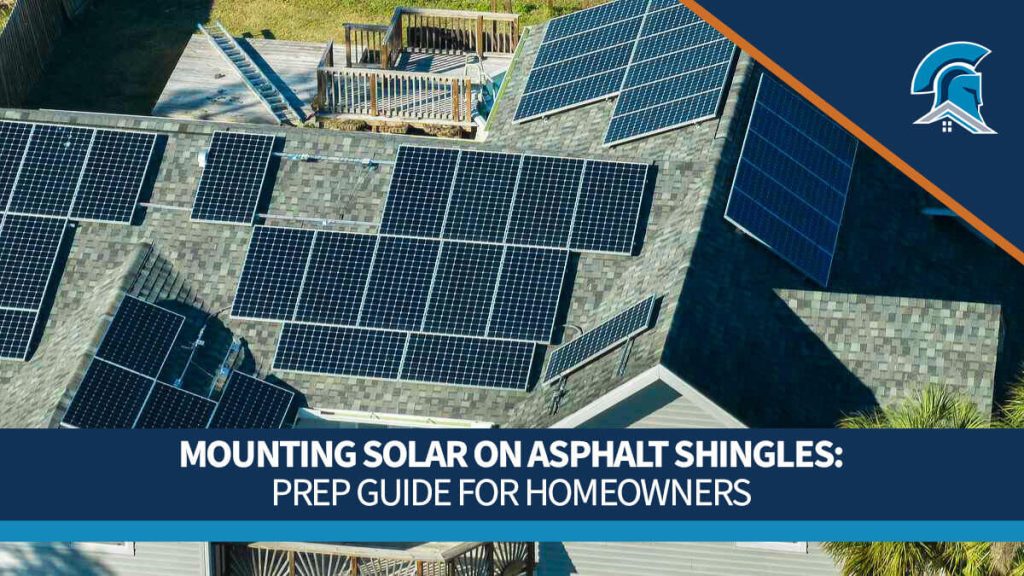 Top-down view of an asphalt shingle roof with solar panels.