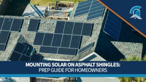 Top-down view of an asphalt shingle roof with solar panels.